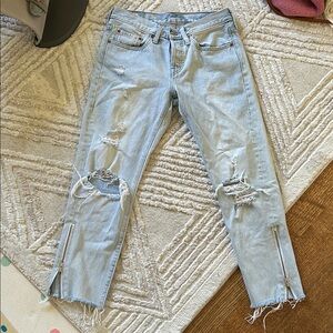 Levi’s women’s Light Blue Distressed Jeans with Zipper Details